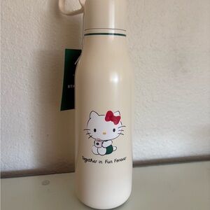 STARBUCKS Hello Kitty Cream Bottle with Red Bow and Green Accent